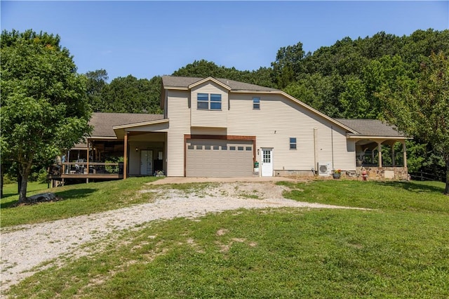 21569 Sibley Rd, Sulphur Springs, AR 72768 - view of front of home with dirt driveway, a front yard, and an attached garage