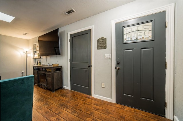 21569 Sibley Rd, Sulphur Springs, AR 72768 - foyer featuring dark wood-style floors and a skylight