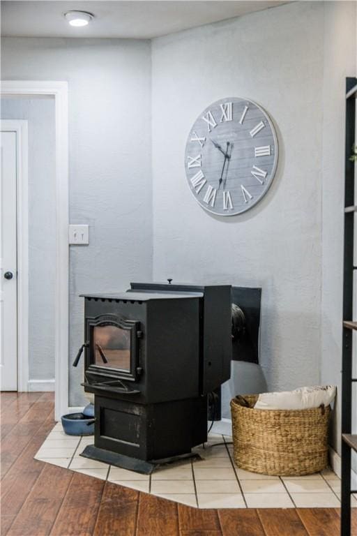 21569 Sibley Rd, Sulphur Springs, AR 72768 - detailed view of a wood stove and wood finished floors