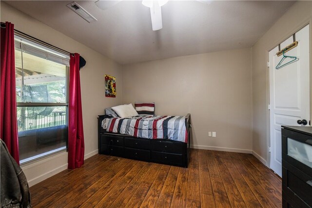 21569 Sibley Rd, Sulphur Springs, AR 72768 - bedroom featuring hardwood / wood-style flooring and ceiling fan