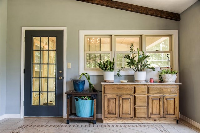 21569 Sibley Rd, Sulphur Springs, AR 72768 - doorway to outside featuring light tile patterned flooring and baseboards