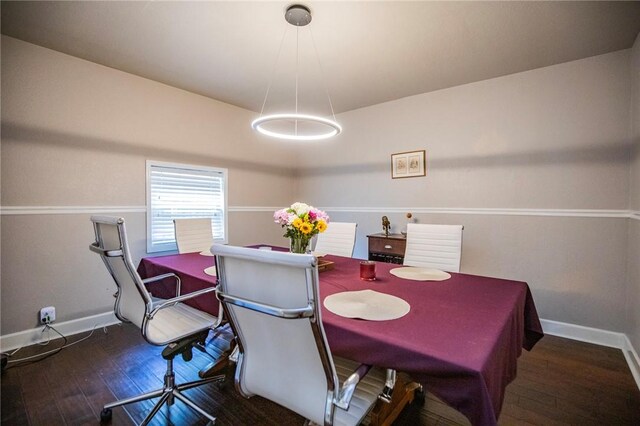 704 NW 8th St, Bentonville, AR 72712 - dining room with baseboards and hardwood / wood-style floors
