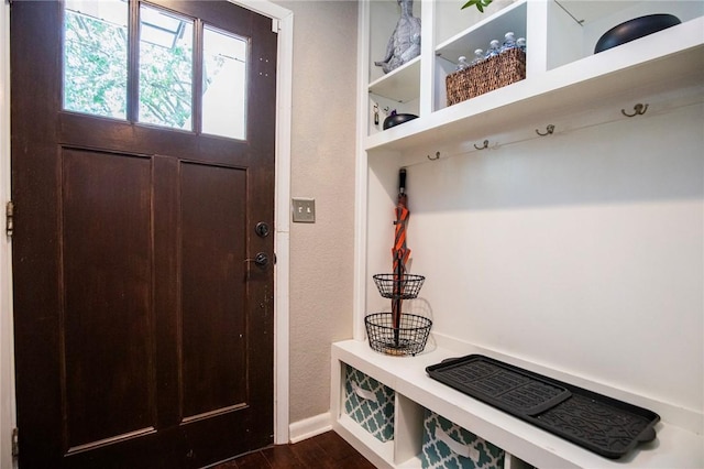 704 NW 8th St, Bentonville, AR 72712 - mudroom featuring dark wood finished floors and baseboards