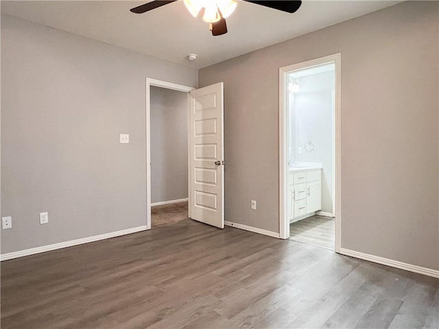 4082 W Sardinia Way, Fayetteville, AR 72704 - spare room with a ceiling fan, wood finished floors, and a smoke detector