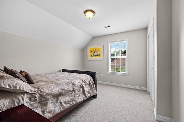 1754 N Hartford Dr, Fayetteville, AR 72701 - carpeted bedroom with baseboards and lofted ceiling