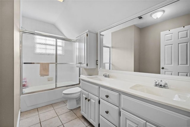 1754 N Hartford Dr, Fayetteville, AR 72701 - full bathroom with double vanity, combined bath / shower with glass door, tile patterned flooring, and vaulted ceiling