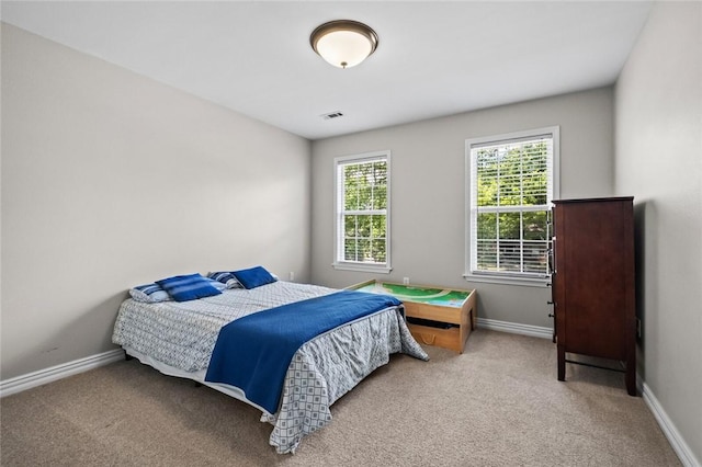 1754 N Hartford Dr, Fayetteville, AR 72701 - carpeted bedroom featuring baseboards