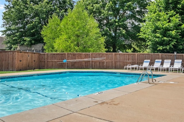 1754 N Hartford Dr, Fayetteville, AR 72701 - community pool with a fenced backyard and a patio area
