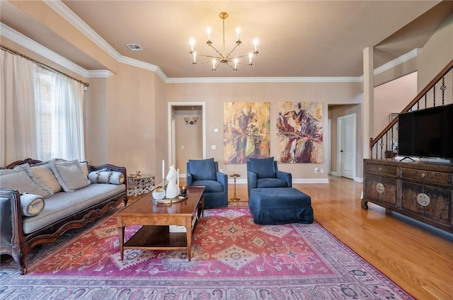 1531 Partridge Run, Bentonville, AR 72713 - living area with a chandelier, wood finished floors, crown molding, and stairs