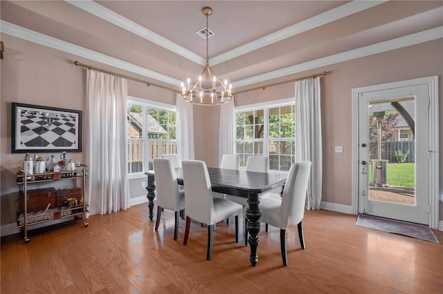 1531 Partridge Run, Bentonville, AR 72713 - dining space featuring a chandelier, wood finished floors, and crown molding