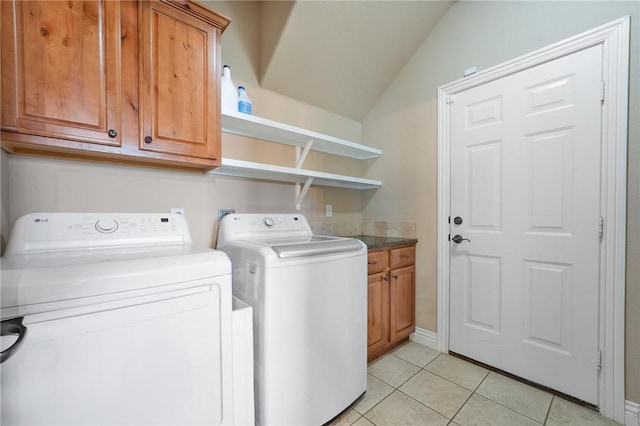 1531 Partridge Run, Bentonville, AR 72713 - washroom featuring cabinet space, separate washer and dryer, and light tile patterned flooring