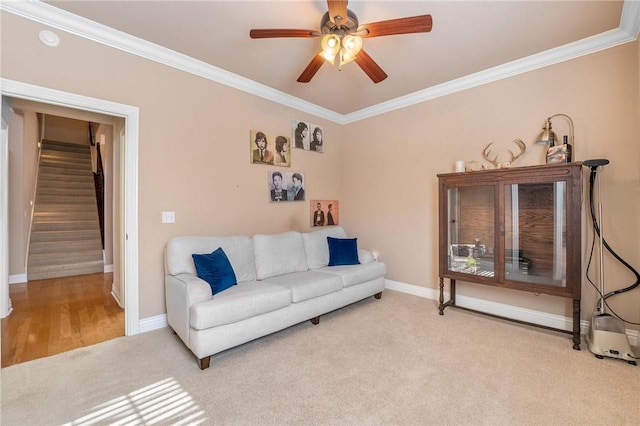 1531 Partridge Run, Bentonville, AR 72713 - carpeted living area with crown molding, ceiling fan, and stairway