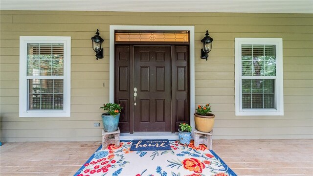19641 Conestoga Rd, Elkins, AR 72727 - view of exterior entry featuring covered porch