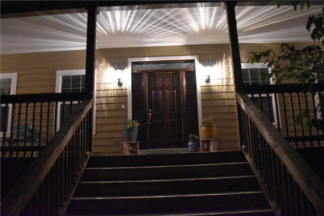 19641 Conestoga Rd, Elkins, AR 72727 - doorway to property featuring a porch