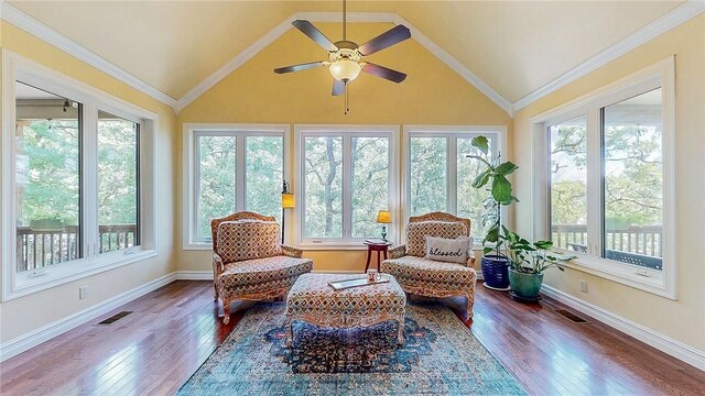 19641 Conestoga Rd, Elkins, AR 72727 - sunroom featuring plenty of natural light, hardwood / wood-style flooring, vaulted ceiling, and ornamental molding