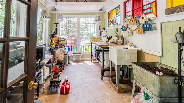 19641 Conestoga Rd, Elkins, AR 72727 - miscellaneous room featuring unfinished concrete floors