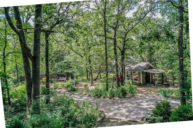 19641 Conestoga Rd, Elkins, AR 72727 - view of yard featuring a view of trees and an outdoor structure