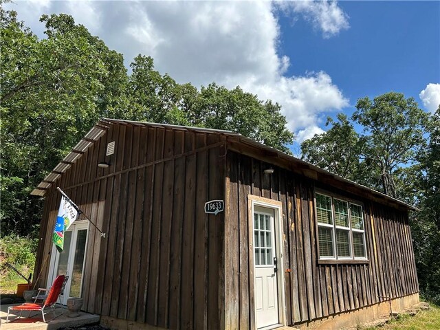 19641 Conestoga Rd, Elkins, AR 72727 - view of home's exterior featuring board and batten siding