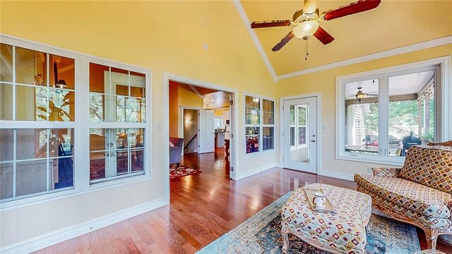 19641 Conestoga Rd, Elkins, AR 72727 - sitting room with ceiling fan, wood finished floors, and high vaulted ceiling
