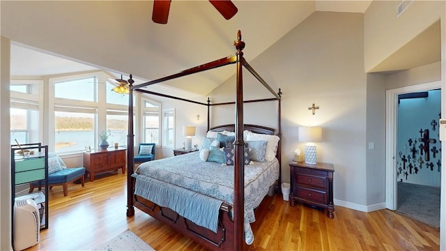 8271 S Lakeshore Dr, Rogers, AR 72756 - bedroom with wood finished floors, high vaulted ceiling, and ceiling fan