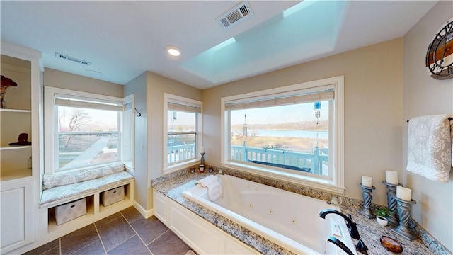 8271 S Lakeshore Dr, Rogers, AR 72756 - full bath with a whirlpool tub and plenty of natural light