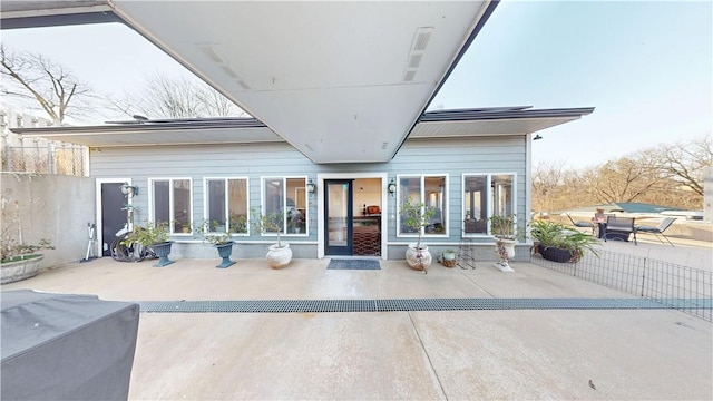 8271 S Lakeshore Dr, Rogers, AR 72756 - back of property with a patio area