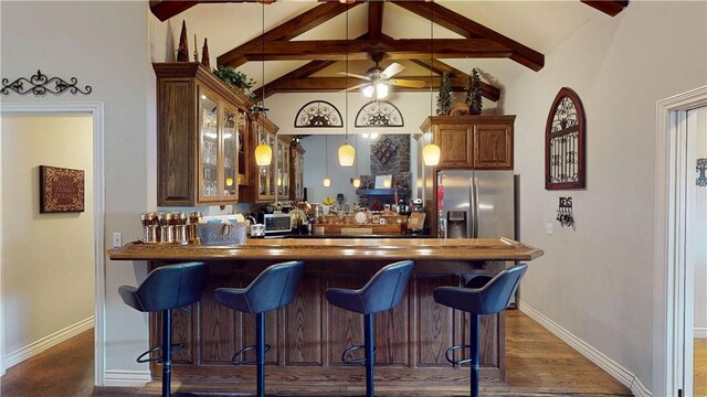 8271 S Lakeshore Dr, Rogers, AR 72756 - indoor bar featuring stainless steel refrigerator with ice dispenser, beamed ceiling, ceiling fan, dark wood-style floors, and high vaulted ceiling