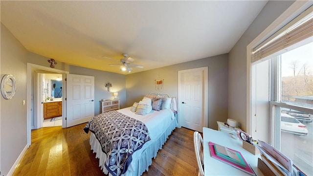 8271 S Lakeshore Dr, Rogers, AR 72756 - bedroom featuring light wood-type flooring and a ceiling fan