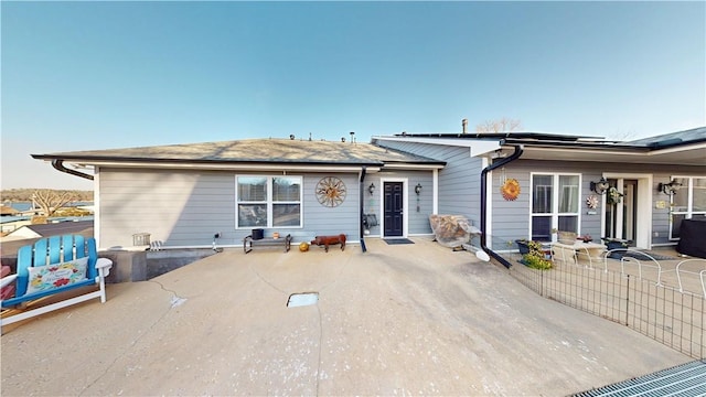 8271 S Lakeshore Dr, Rogers, AR 72756 - back of property with a patio