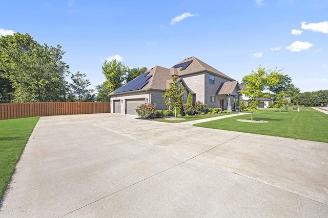 1575 Lake Estates Dr, Springdale, AR 72762 - view of side of home with solar panels, driveway, and a garage