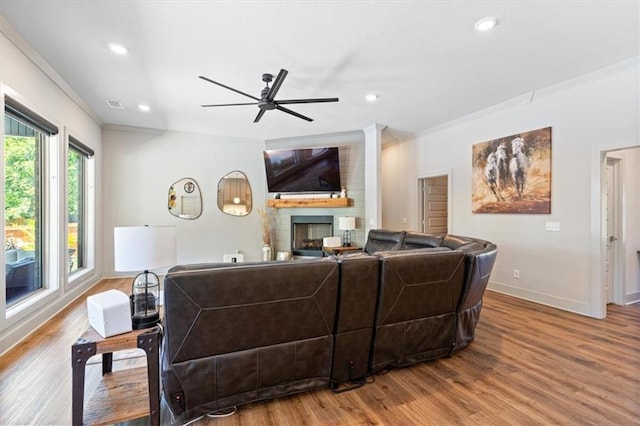 1575 Lake Estates Dr, Springdale, AR 72762 - living area with a fireplace, a ceiling fan, wood finished floors, ornamental molding, and recessed lighting