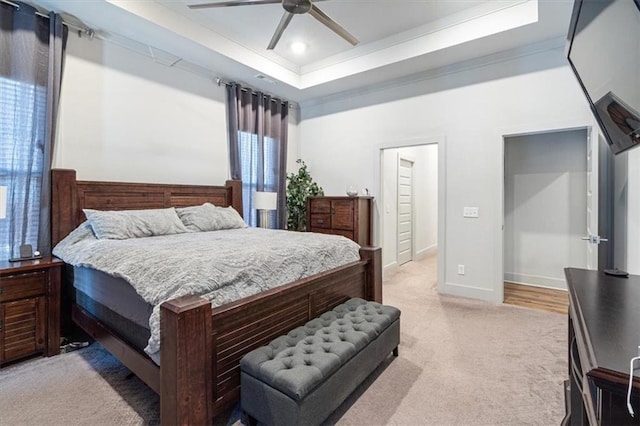 1575 Lake Estates Dr, Springdale, AR 72762 - bedroom with a tray ceiling, light carpet, recessed lighting, multiple windows, and ceiling fan