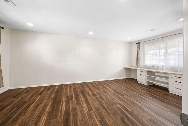 2001 Pin Oak Dr, Springdale, AR 72762 - spare room with built in desk, dark wood-style flooring, and recessed lighting