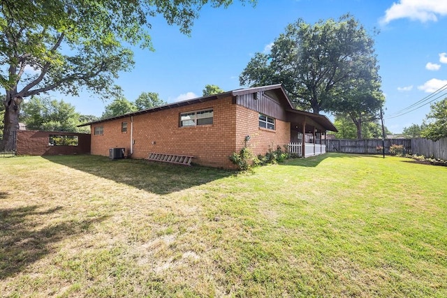 2001 Pin Oak Dr, Springdale, AR 72762 - view of side of property with a fenced backyard and brick siding