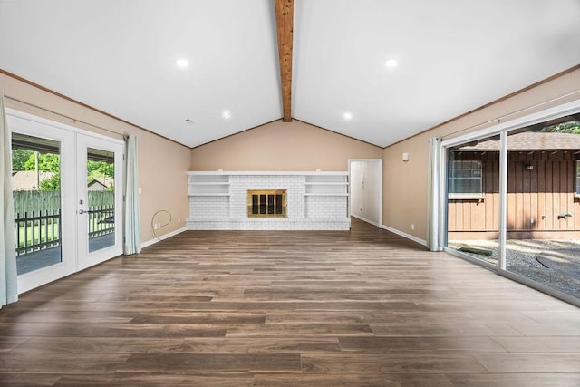2001 Pin Oak Dr, Springdale, AR 72762 - unfurnished living room featuring french doors, wood finished floors, a brick fireplace, and recessed lighting
