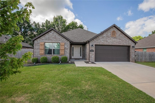 7655 Longspur Ave, Springdale, AR 72762 - view of front of property featuring brick siding, an attached garage, driveway, and a shingled roof