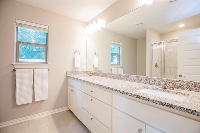 7655 Longspur Ave, Springdale, AR 72762 - bathroom featuring double vanity, a stall shower, and tile patterned flooring