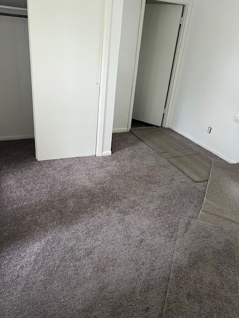 18588 W Rheas Community Rd, Lincoln, AR 72744 - unfurnished bedroom featuring carpet flooring and baseboards