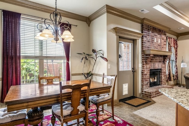 3004 N 16th St, Rogers, AR 72756 - dining room with crown molding, a chandelier, healthy amount of natural light, and a brick fireplace