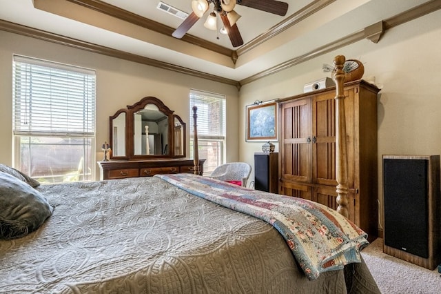 3004 N 16th St, Rogers, AR 72756 - bedroom with carpet flooring, a tray ceiling, ornamental molding, and ceiling fan