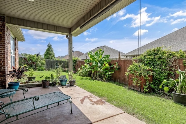 3004 N 16th St, Rogers, AR 72756 - fenced backyard featuring a patio area