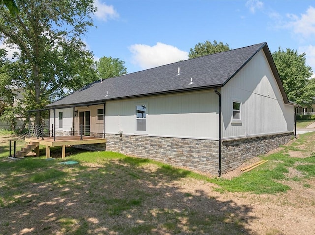 1348 Columbine Cv, Harrison, AR 72601 - rear view of house with stone siding, a wooden deck, roof with shingles, and stairway