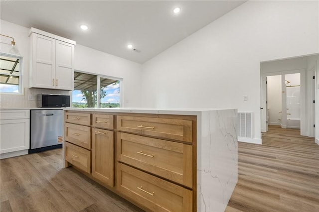 1348 Columbine Cv, Harrison, AR 72601 - kitchen featuring appliances with stainless steel finishes, light wood finished floors, light countertops, recessed lighting, and healthy amount of natural light