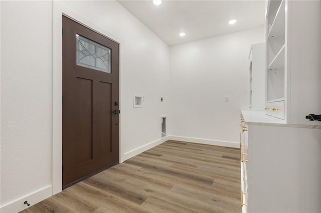 1348 Columbine Cv, Harrison, AR 72601 - washroom with electric dryer hookup, washer hookup, light wood-style floors, and recessed lighting