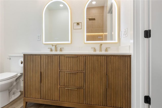 1348 Columbine Cv, Harrison, AR 72601 - bathroom with double vanity, wood finished floors, and a shower