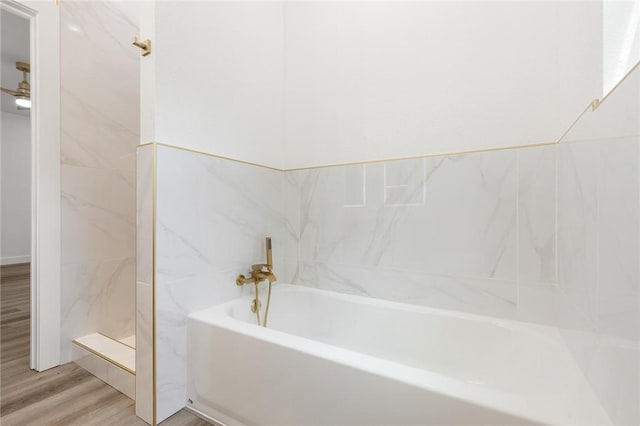 1348 Columbine Cv, Harrison, AR 72601 - full bathroom featuring a garden tub and wood finished floors