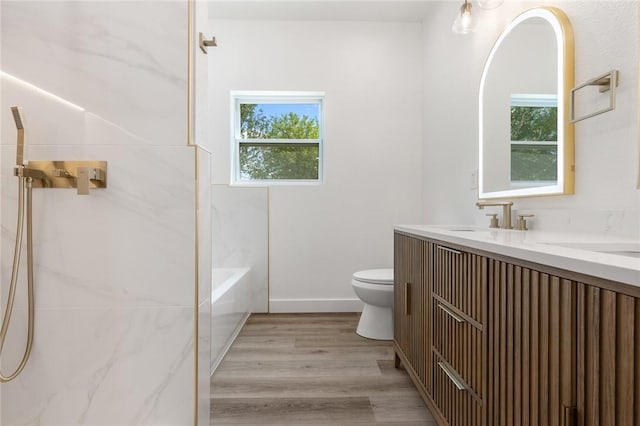 1348 Columbine Cv, Harrison, AR 72601 - full bath featuring double vanity, plenty of natural light, wood finished floors, and  shower combination