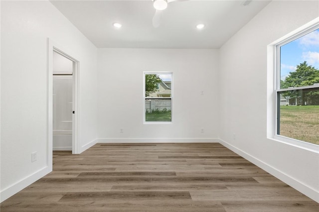 1348 Columbine Cv, Harrison, AR 72601 - empty room featuring a ceiling fan, wood finished floors, and recessed lighting