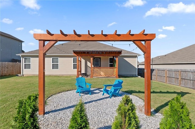2504 Maplewood Ave, Lowell, AR 72745 - rear view of property featuring a fenced backyard, a pergola, a patio area, and roof with shingles