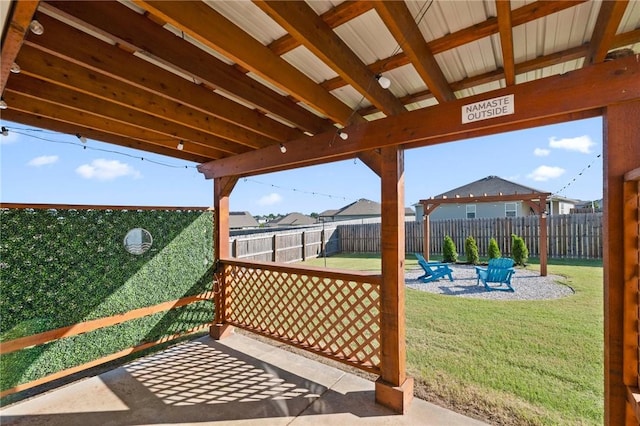 2504 Maplewood Ave, Lowell, AR 72745 - wooden terrace featuring a patio, a fenced backyard, and a residential view
